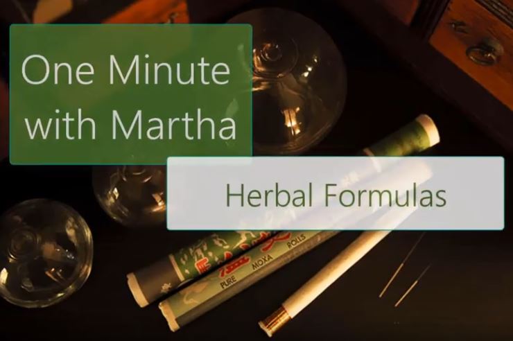 A table with cups and cigarettes, along with the words 'One Minute with Martha, Herbal formulas