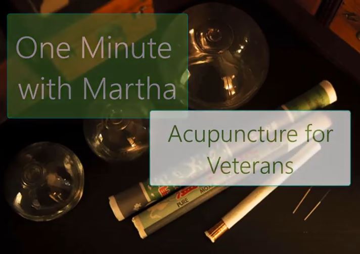 A table with cups and cigarettes, along with the words 'One Minute with Martha, Acupuncture for veterans